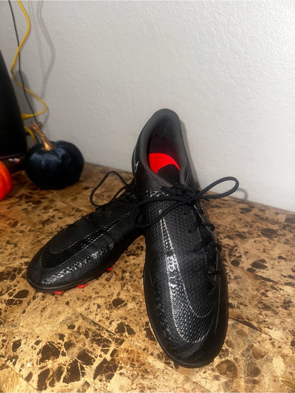 Nike Men's Black Athletic Soccer Cleats with Red Accents